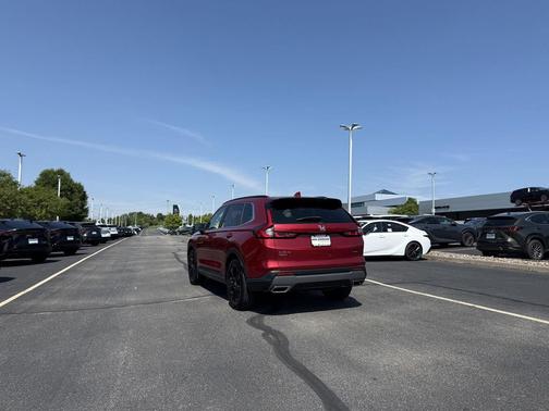 Radiant Red Metallic 2025 Honda CR-V Hybrid Sport Touring AWD