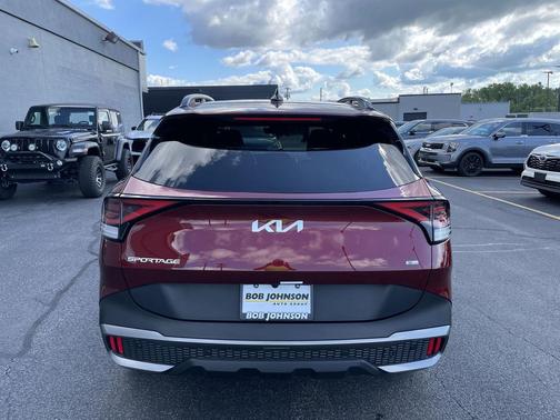 Dawning Red 2024 Kia Sportage Plug-In Hybrid X-Line Prestige