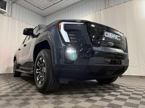 Deep Ocean Metallic 2026 GMC Sierra EV Standard Range Elevation