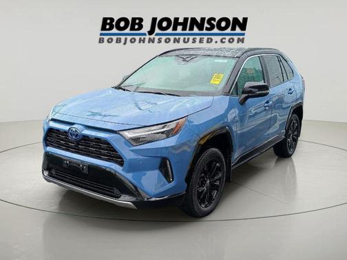 Cavalry Blue/Midnight Black Metallic 2024 Toyota RAV4 Hybrid SE
