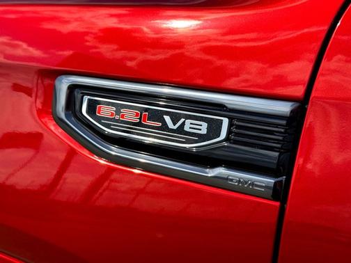 Volcanic Red Tintcoat 2024 GMC Sierra 1500 AT4
