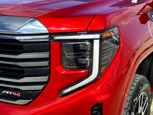 Volcanic Red Tintcoat 2024 GMC Sierra 1500 AT4