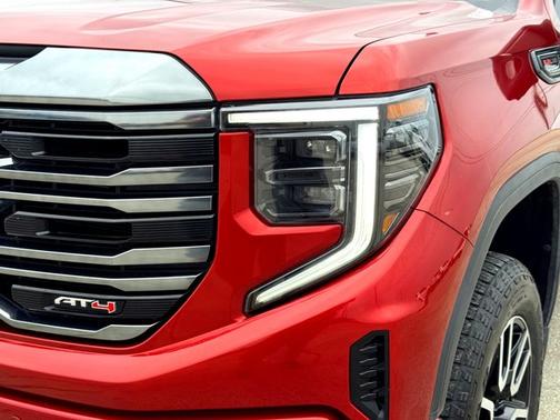 Volcanic Red Tintcoat 2024 GMC Sierra 1500 AT4