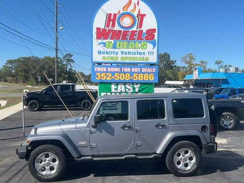 Silver 2014 Jeep Wrangler Unlimited Sahara