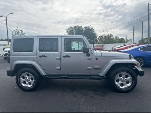 Silver 2014 Jeep Wrangler Unlimited Sahara