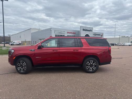 Volcanic Red Tintcoat 2024 GMC Yukon XL 4WD AT4