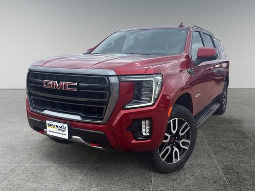Volcanic Red Tintcoat 2024 GMC Yukon XL 4WD AT4