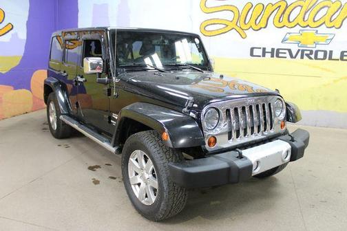 Black 2013 Jeep Wrangler Unlimited Sahara