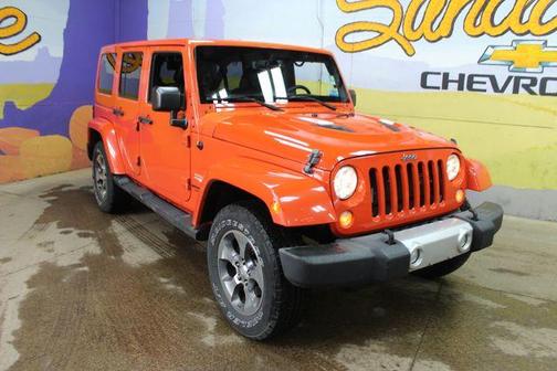 Sunset Orange Pearlcoat 2015 Jeep Wrangler Unlimited Sahara