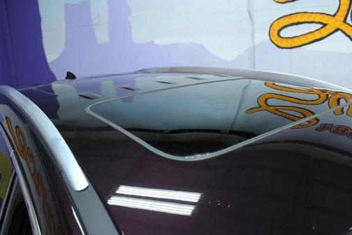 Rich Garnet Metallic 2023 Buick Enclave Avenir