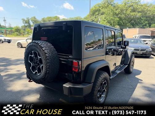 Black 2014 Jeep Wrangler Unlimited Sport