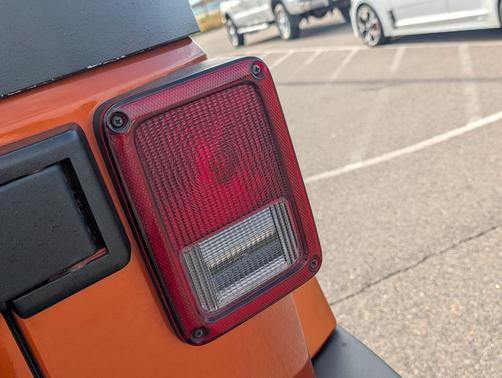 Mango Tango Pearl 2010 Jeep Wrangler Unlimited Sahara