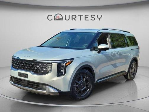 Ivory Silver 2025 Kia Carnival SX