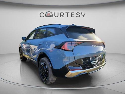 Heritage Blue 2026 Kia Sportage Hybrid SX-Prestige