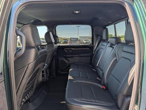 Serrano Green Metallic 2026 RAM 1500 RHO Crew Cab 4x4 5'7' Box