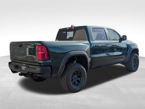 Serrano Green Metallic 2026 RAM 1500 RHO Crew Cab 4x4 5'7' Box