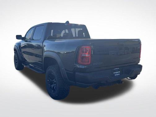 Diamond Black Crystal Pearlcoat 2026 RAM 1500 RHO Crew Cab 4x4 5'7' Box