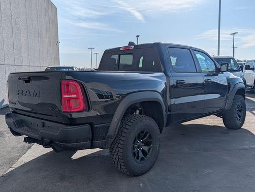 Diamond Black Crystal Pearlcoat 2026 RAM 1500 RHO Crew Cab 4x4 5'7' Box