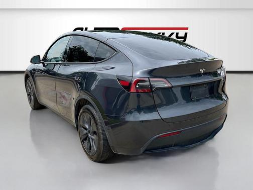 Solid Black 2025 Tesla Model Y Long Range Dual Motor Rear-Wheel Drive