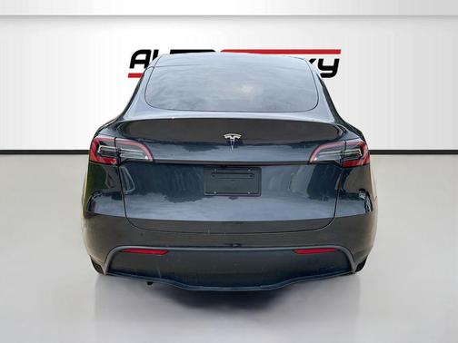 Solid Black 2025 Tesla Model Y Long Range Dual Motor Rear-Wheel Drive
