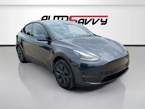 Solid Black 2025 Tesla Model Y Long Range Dual Motor Rear-Wheel Drive