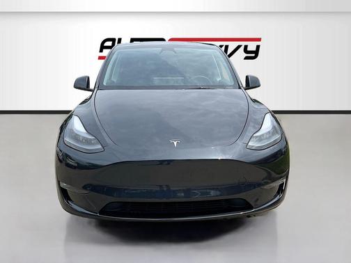 Solid Black 2025 Tesla Model Y Long Range Dual Motor Rear-Wheel Drive