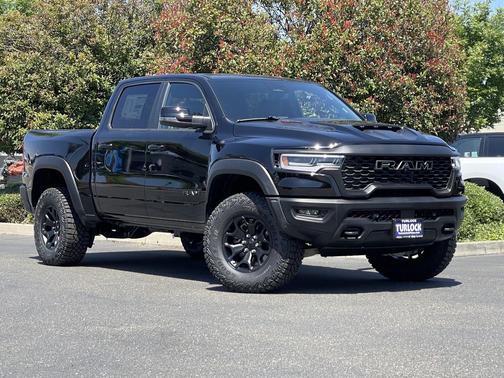 Diamond Black Crystal Pearlcoat 2026 RAM 1500 RHO Crew Cab 4x4 5'7' Box