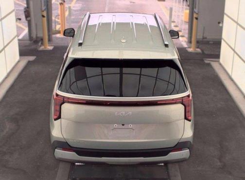 Ivory 2025 Kia Carnival EX