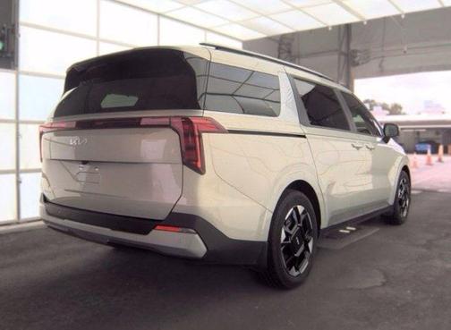 Ivory 2025 Kia Carnival EX