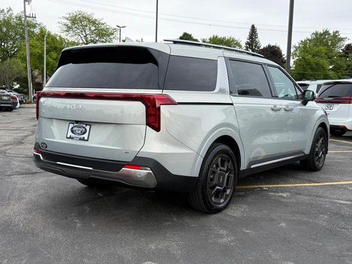 Ivory Silver 2025 Kia Carnival Hybrid SX