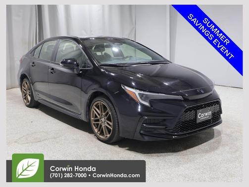 Midnight Black Metallic 2024 Toyota Corolla Hybrid L