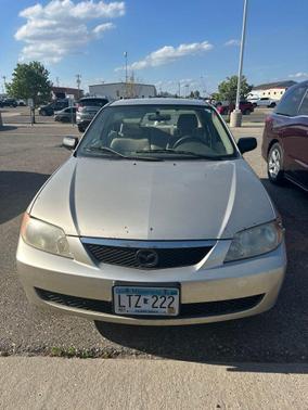 Tan 2002 Mazda Protege