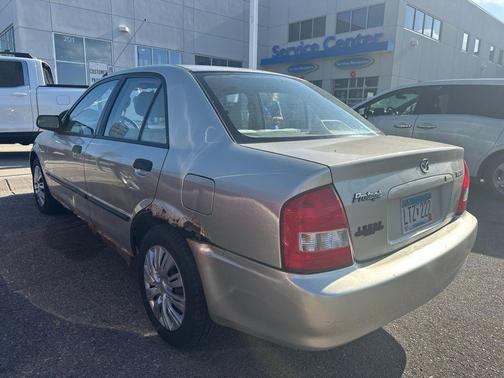 Tan 2002 Mazda Protege
