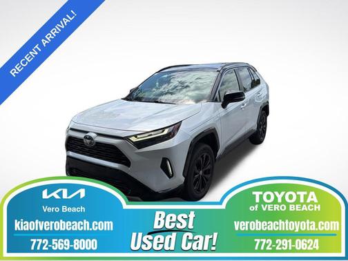 Wind Chill Pearl/Midnight Black Metallic 2023 Toyota RAV4 Hybrid SE