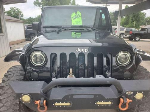 Black 2013 Jeep Wrangler Unlimited Sahara
