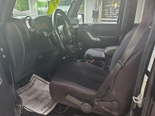 Black 2013 Jeep Wrangler Unlimited Sahara