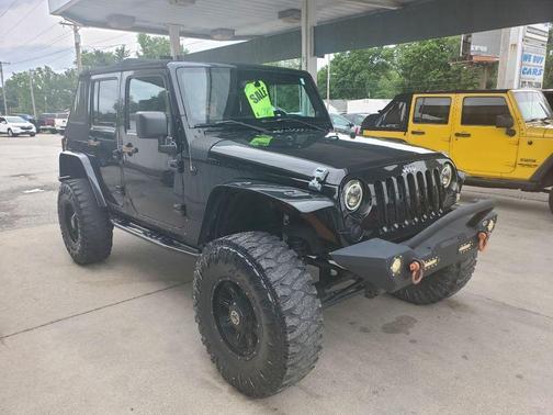 Black 2013 Jeep Wrangler Unlimited Sahara