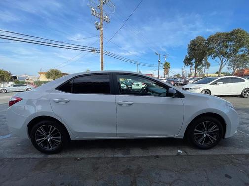 Super White 2016 Toyota Corolla LE Plus