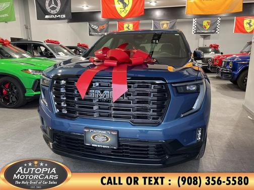 Downpour Metallic 2026 GMC Acadia Denali
