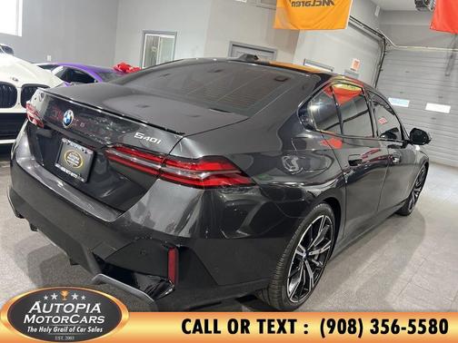 Black 2024 BMW 540 xDrive