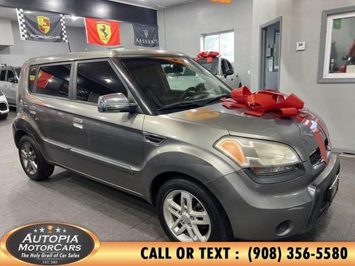 Bright Silver 2010 Kia Soul +
