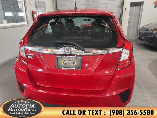 Red 2015 Honda Fit EX