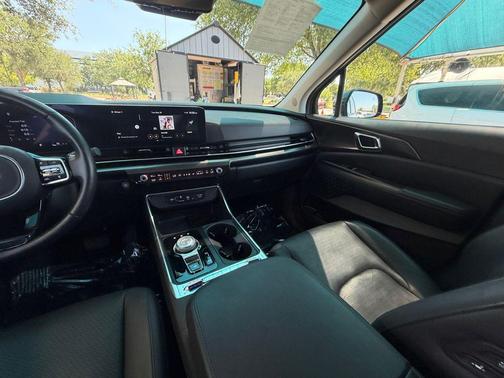 Aurora Black Pearl 2025 Kia Carnival Hybrid SX Prestige