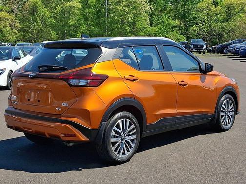 Monarch Orange Metallic/Super Black 2023 Nissan Kicks SV