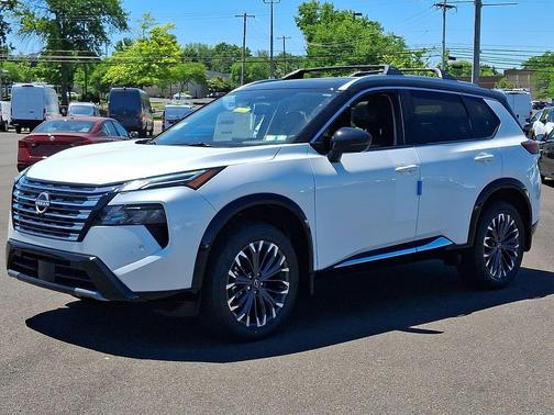 Everest White Pearl/Super Black 2026 Nissan Rogue Platinum