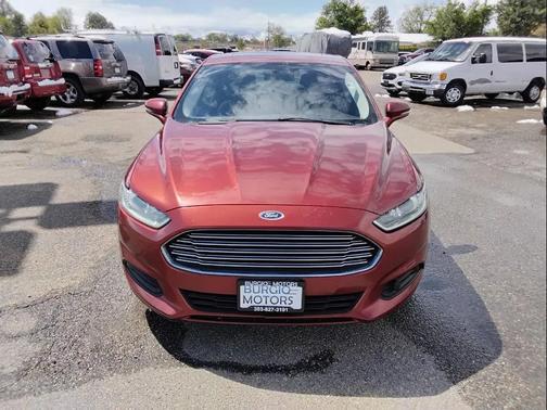 Orange 2014 Ford Fusion SE