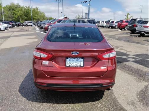 Orange 2014 Ford Fusion SE