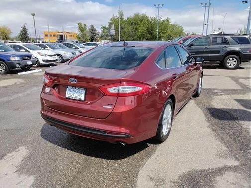 Orange 2014 Ford Fusion SE