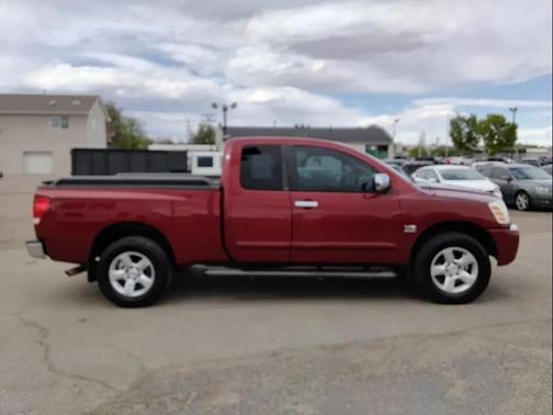 Red 2004 Nissan Titan SE King Cab