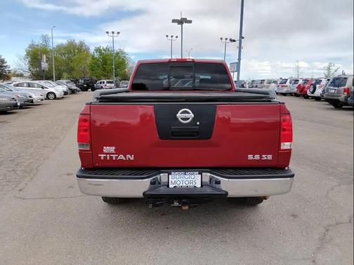 Red 2004 Nissan Titan SE King Cab